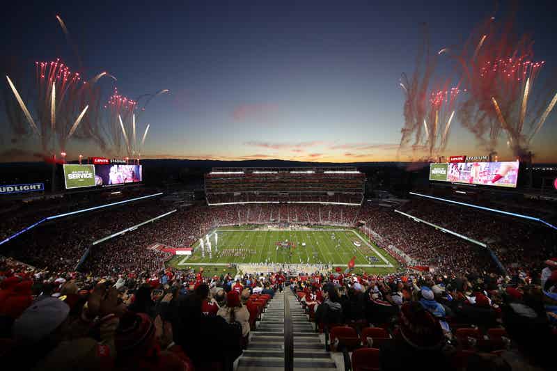 An evening view of Levi's Stadium during a 49ers game, as fireworks go off