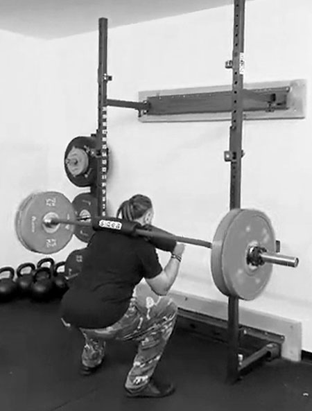 Fabio performing the squat during his rehab